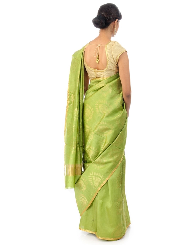 Picture of Pista Green Colored Hand Woven Cotton Shari Crafted with Lotus Art Design