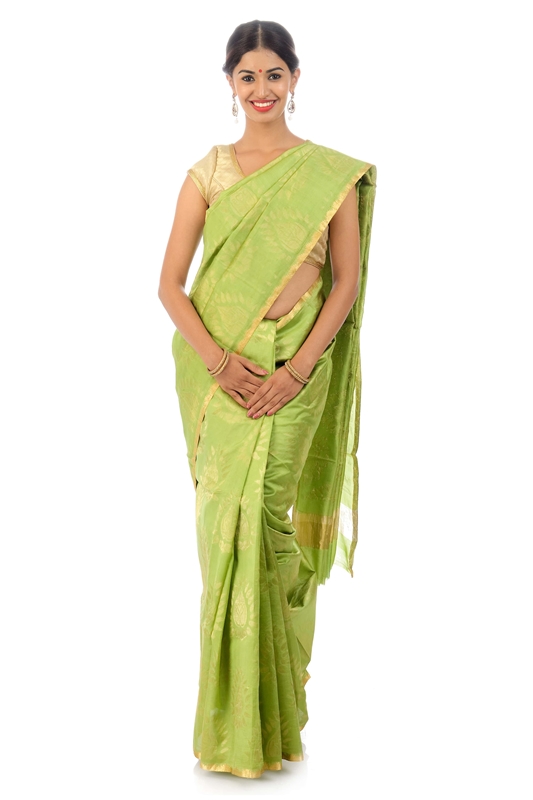 Picture of Pista Green Colored Hand Woven Cotton Shari Crafted with Lotus Art Design