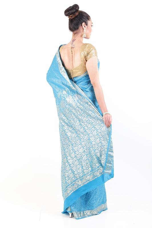 Picture of Sky Blue Banarasi Silk Saree with Silver Peepal Leaf Design Border